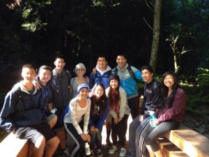 APES students pose for a picture in the Muir Woods forest after their lunch break. 