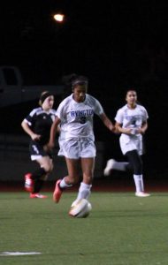 Junior Samiksha Alur dribbles the ball down the field during third quarter. 