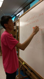 Senior Justin Wang plays Pictionary with friends during advisory. (Photo: Shannon Tseng)