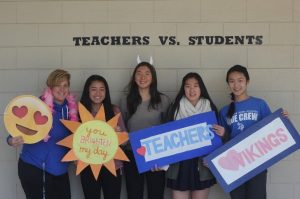 PE teacher Mrs. Martin pose for a picture with her sophomore students Angelica Shao, Sabrina Liu, Jeany Oh, and Qing Huang during lunch (Jessica Nguyen).