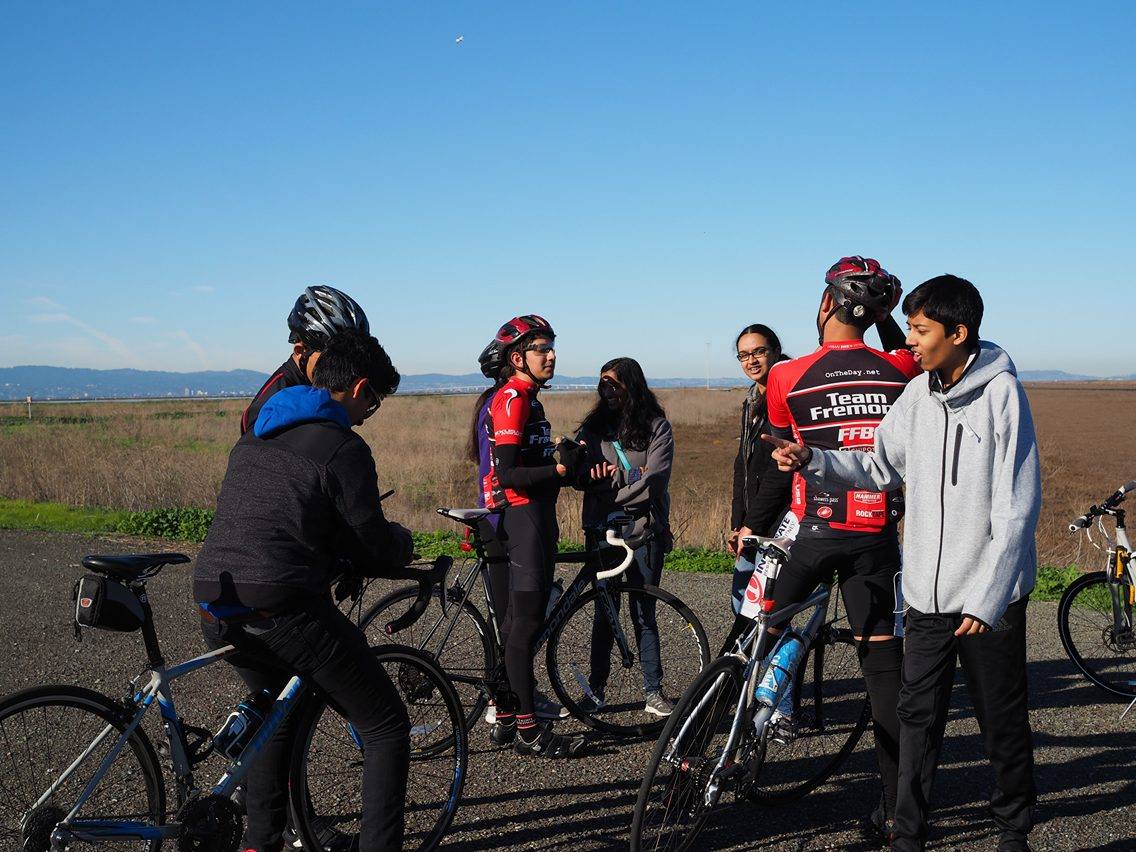 The bikers stop for a quick rest break before continuing on their ride.