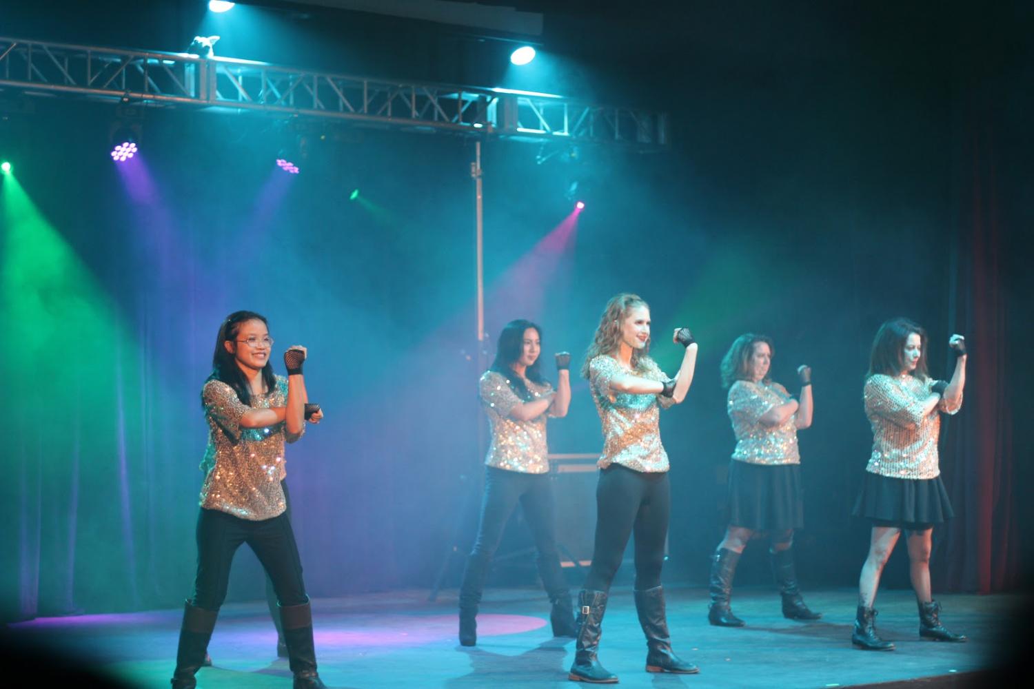 (From left to right) Ms. Dinh, Ms. Lau, Ms. Koehler, Ms. Lin, and Ms. Cooper, strike a power pose while performing to a Beyonce mashup.