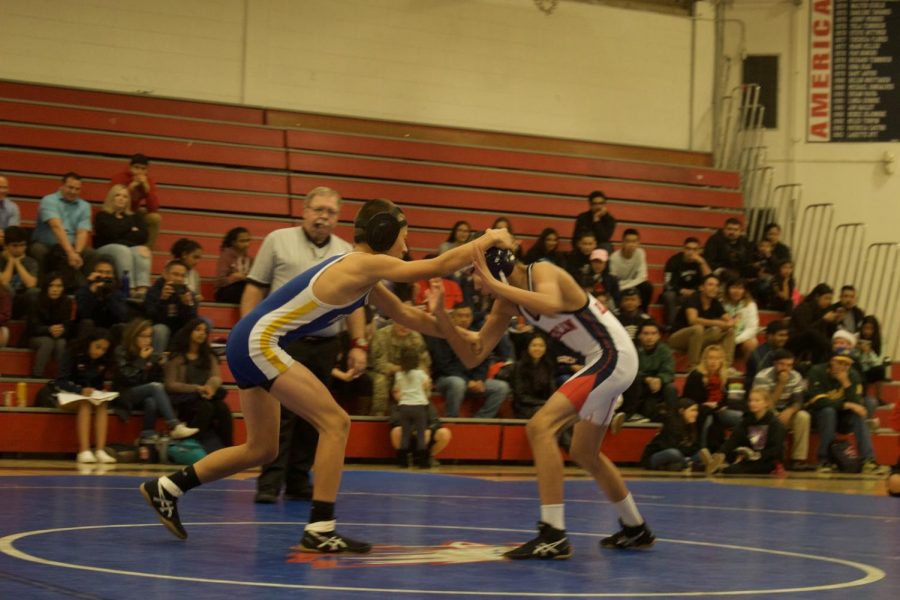 106 Wrestler Hezekiah Crawford (9) against American