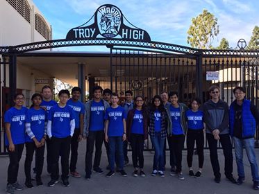 Team Azure poses outside Troy High School 
