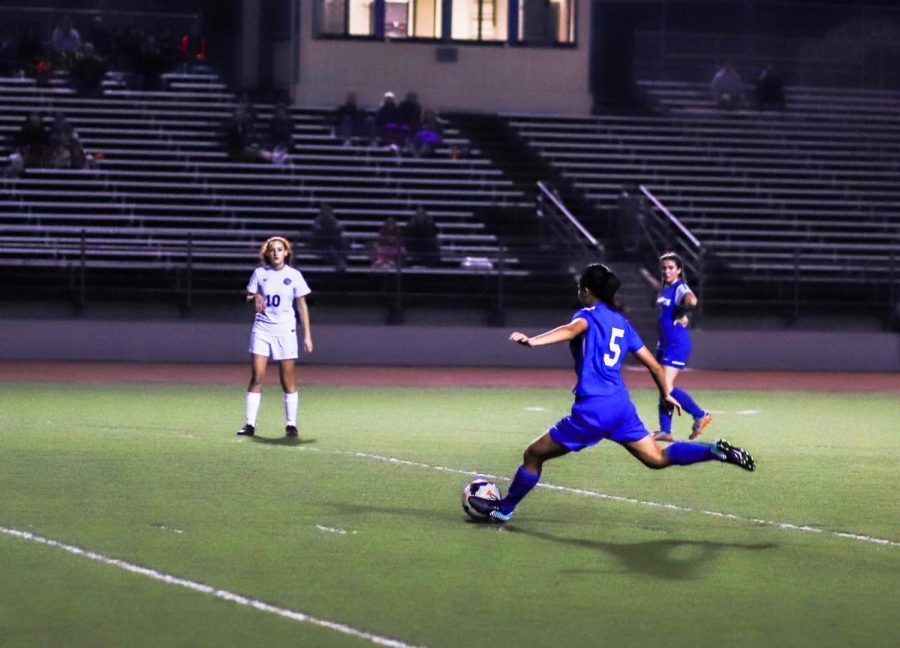 Gabriella del Rosario (11) makes a huge stride as she scores the second goal for Irvington 