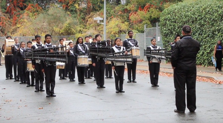 JV+Drumline+prepares+to+perform+their+set+in+front+of+the+judges.