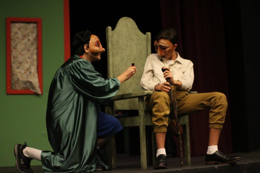 Caption: In Commedia’s first skit, “The Ring,” Arlecchino (Nooran Roeen) (11), proposes to Pantalone (Finley Cumberworth) (10), with a ring pop. 