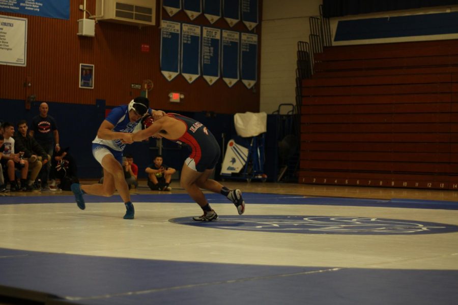 Abtin Olaee (11) fights to maintain the offensive over his American opponent. 
