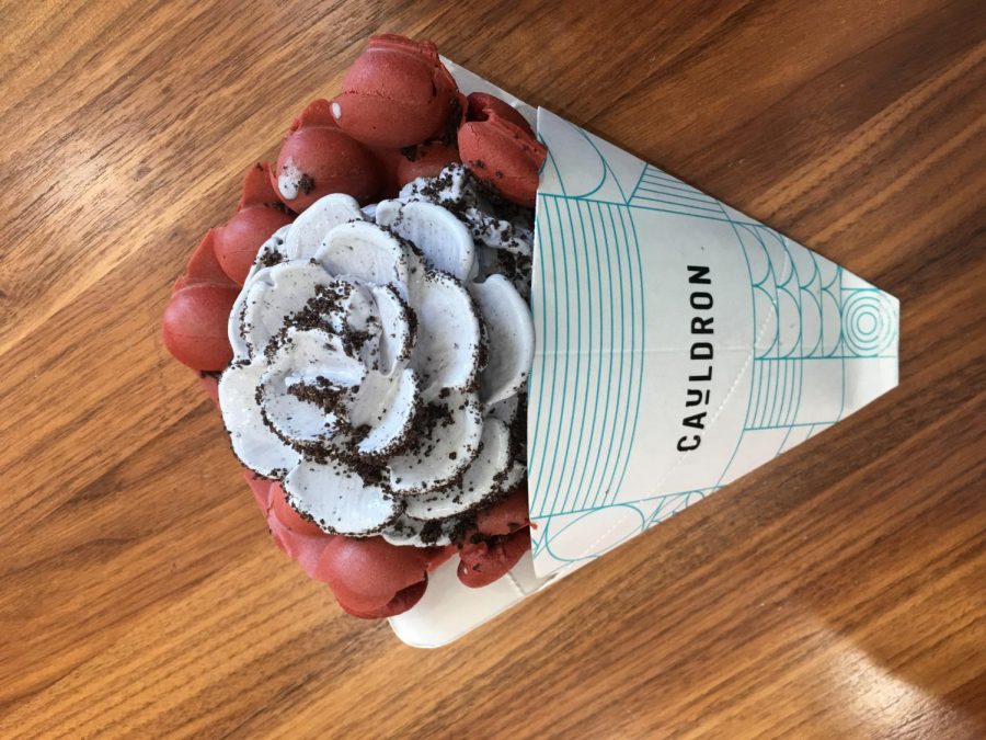 The rose-shaped vanilla ice cream with cinnamon and Oreos on a red velvet Puffle cone design