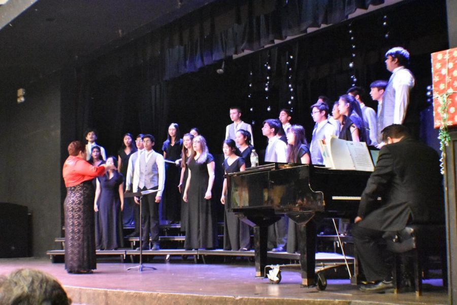 Part of performing during a choir concert involves paying close attention to Ms. Olsen’s conducting and knowing when to enter into the song. 