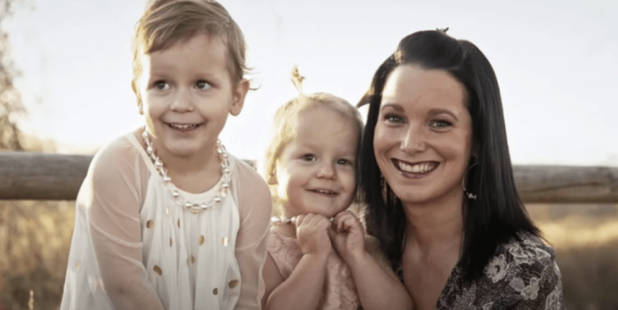 Shannan Watts and her daughters Bella (left) and Celeste (middle) grin happily in a picture at a family photoshoot. 