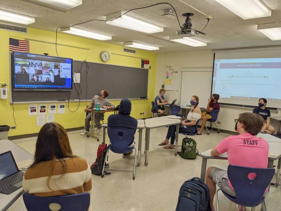 A photo by Matt Torman depicting how a hybrid classroom could be set up (https://blog.zoom.us/high-school-teachers-share-best-practices-for-successful-hybrid-learning/ncssm-ap-stats/).