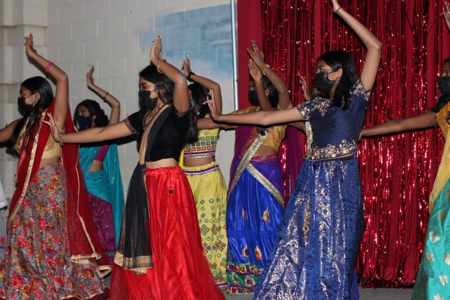 IndoPaks Natya team is pictured performing on stage during Bollywood Night