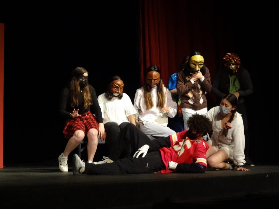 During the “Doctor’s Office” Commedia scene, the Young Male Lover, a football player played by Jacob Hearns (12), trips and hurts his leg. His cheerleader girlfriend, the Young Female Lover played by Avril Brown (10), and several other Commedia characters gather around to check on him.  