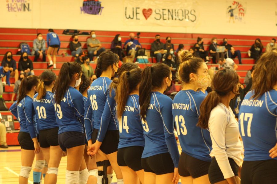 Girls Varsity Volleyball lines up before their final game.
