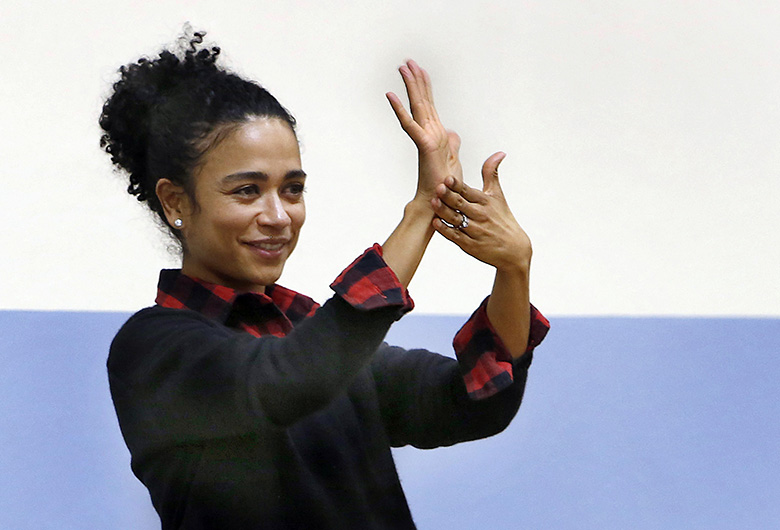 Actress+Lauren+Ridloff+who+played+Makkari+in+Eternals+demonstrates+sign+language.+