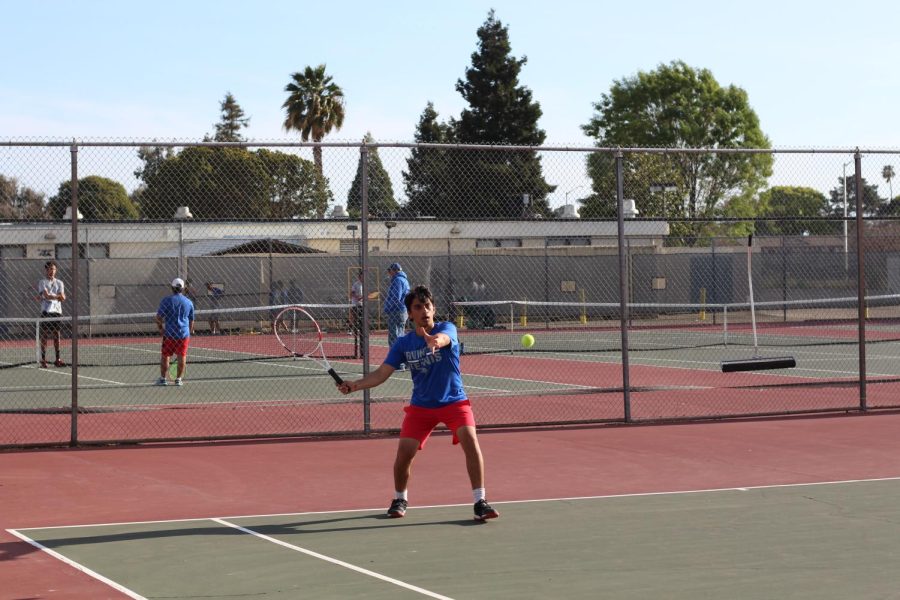 Aayush Shah (11), pictured above, played in the Varsity 5/JV 1 match and defeated his opponent with a score of 8-4.