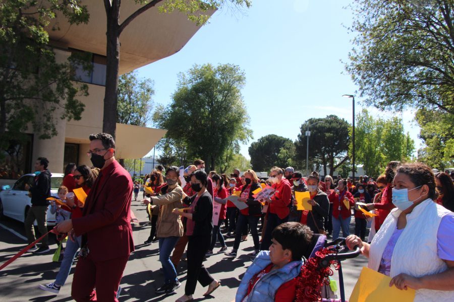 Members of the community join educators to rally for better wages and smaller class sizes