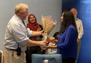 Irvington’s Principal Stan Hicks honors Fahria Khan with a bouquet of
flowers.