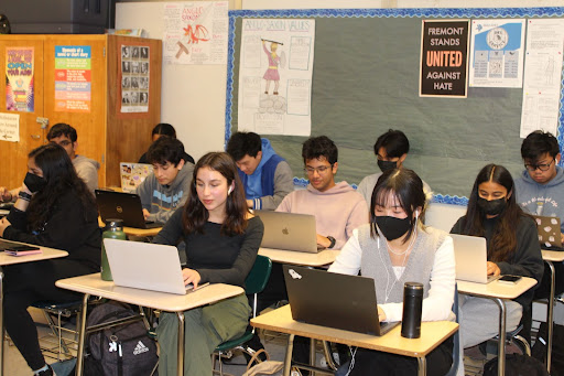 Irvington students are working to complete assignments in an English class, which is especially susceptible to misuse of AI.