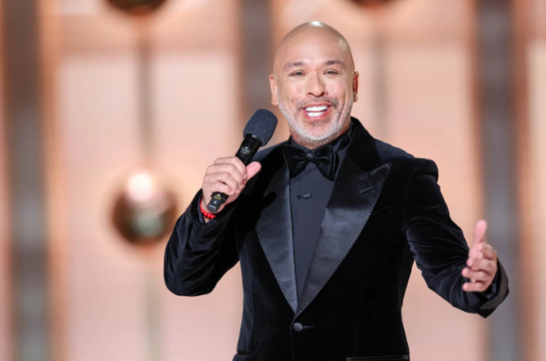 Jo Koy in the middle of his routine at the Golden Globes (Rolling Stone).