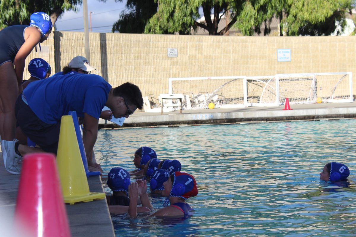 The team strategizes after the second timeout.