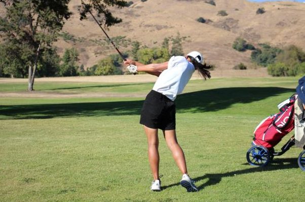 Irvington Girls Golf player Elsa Hsieh (10) strikes the ball