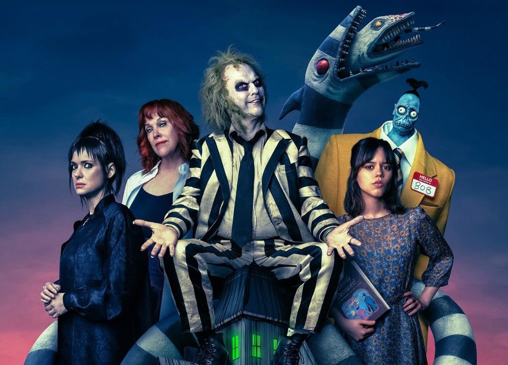 The cover of Tim Burton’s Beetlejuice Beetlejuice emphasizes the return of Michael Keaton as the iconic Beetlejuice.