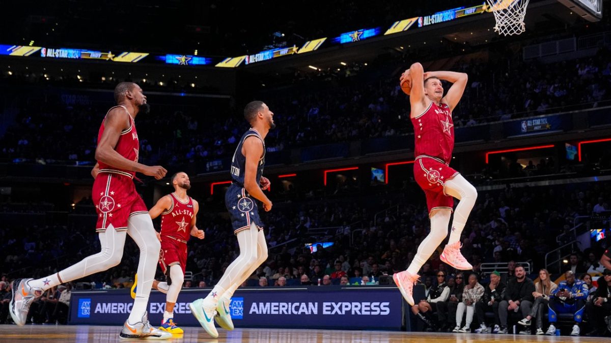 Denver Nuggets center Nikola Jokic (15) dunking during the first half of an NBA All-Star game in Indianapolis, Sunday, Feb. 18, 2024.
