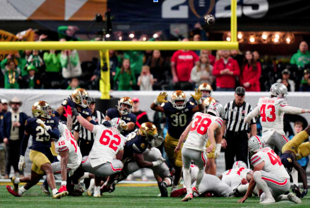 Caption: Ohio state falls back from Notre Dame’s defensive power
Image credit: NPR
