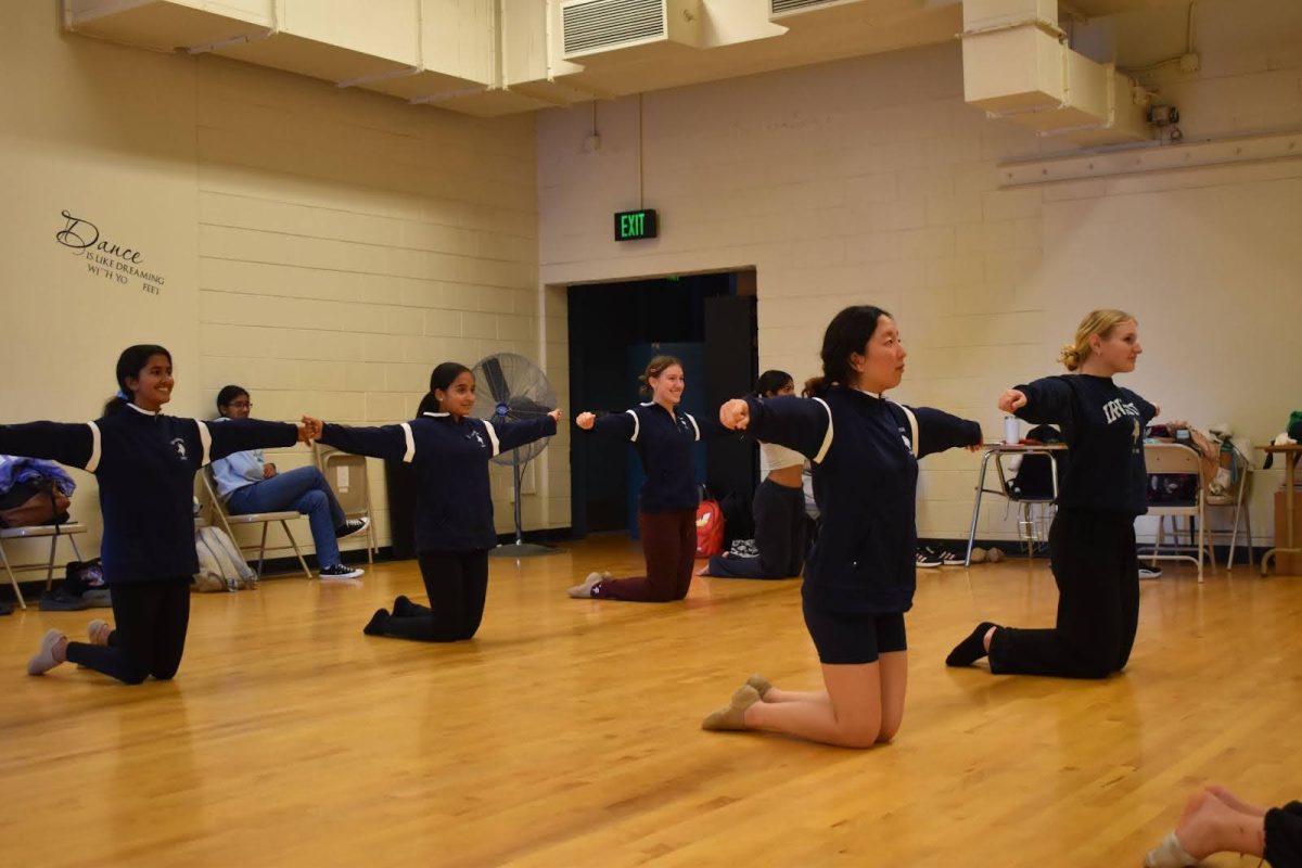 The dance team practices their performance for the regional competition.