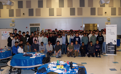 Participants of Viking Hacks pose after a full day of hacking and activities