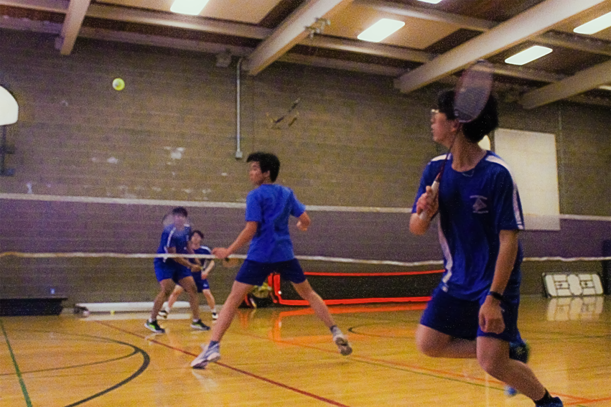 Players face off in a friendly but intense match during Senior Night.