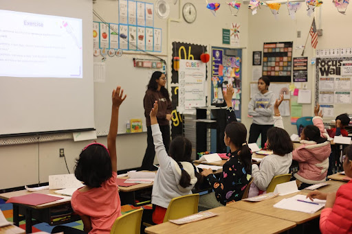 Young students take part in hands-on learning through the recent 6-week program at Hirsch Elementary taught by Irvington students.