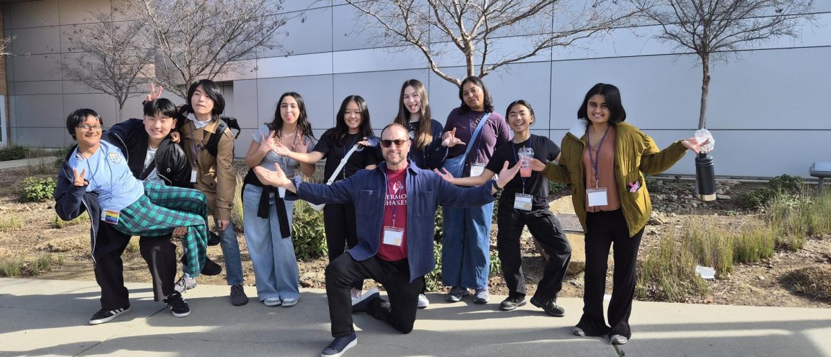 The Irvington representatives at the Lenaea Theatre Festival, prepared with their participant badges and plenty of spirit, pose for a photo outside the venue (Matthew Ballin).