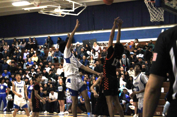Boys’ Varsity Basketball showed energy and determination in a hard-fought last game against Washington on February 13.