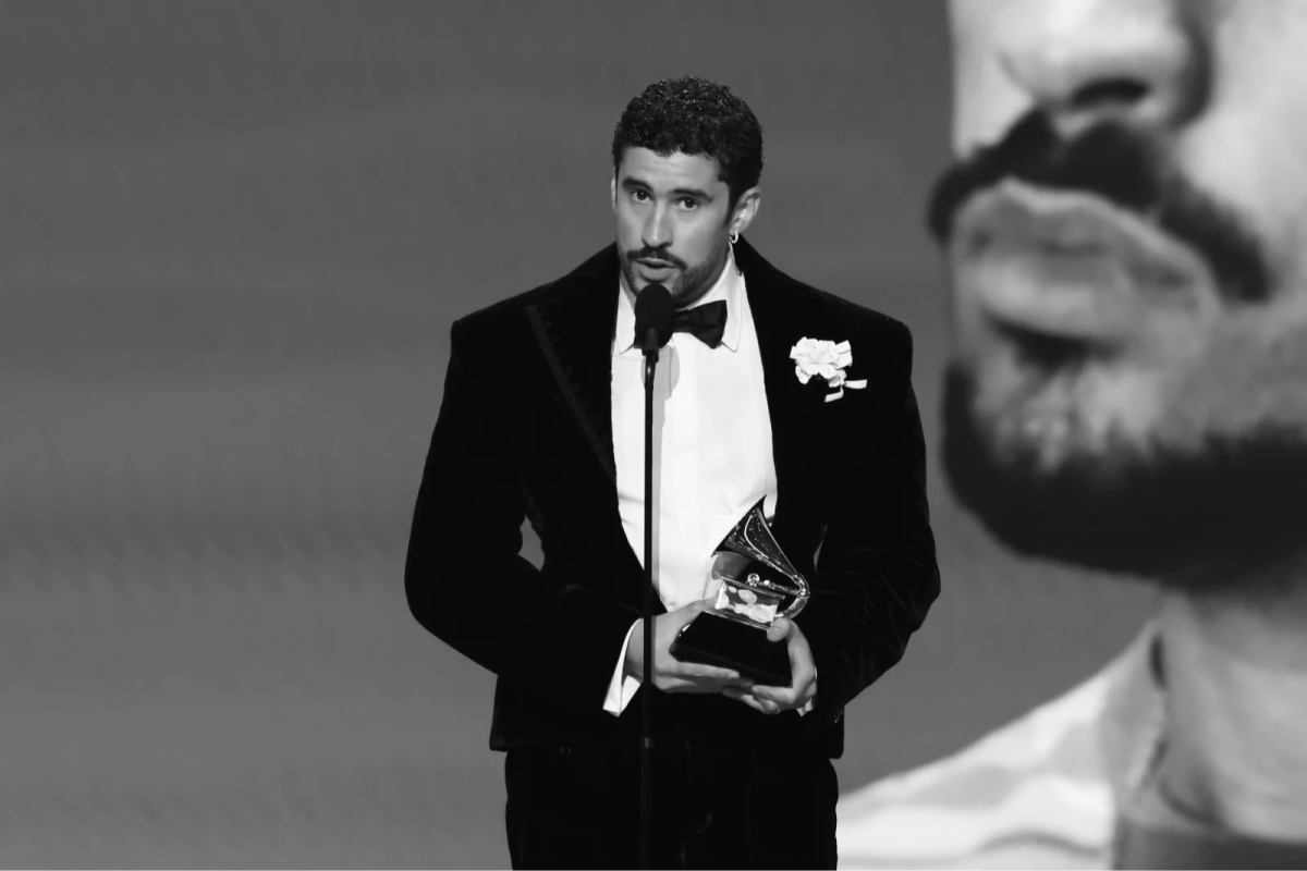 Bad Bunny’s sixth solo studio album, “DeBÍ TiRAR MáS FOToS,” became the first record sung entirely in Spanish to be recognized as Album of the Year (Kevin Winter / Getty Images for The Recording Academy).