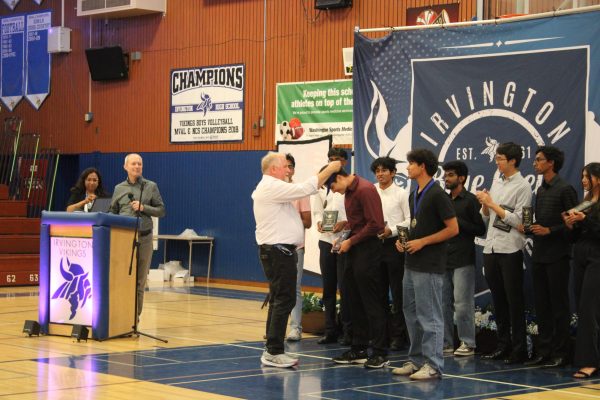 Roland Pratt (12), the valedictorian for the class of 2026, was recognized with a medal presented by Principal Hicks.